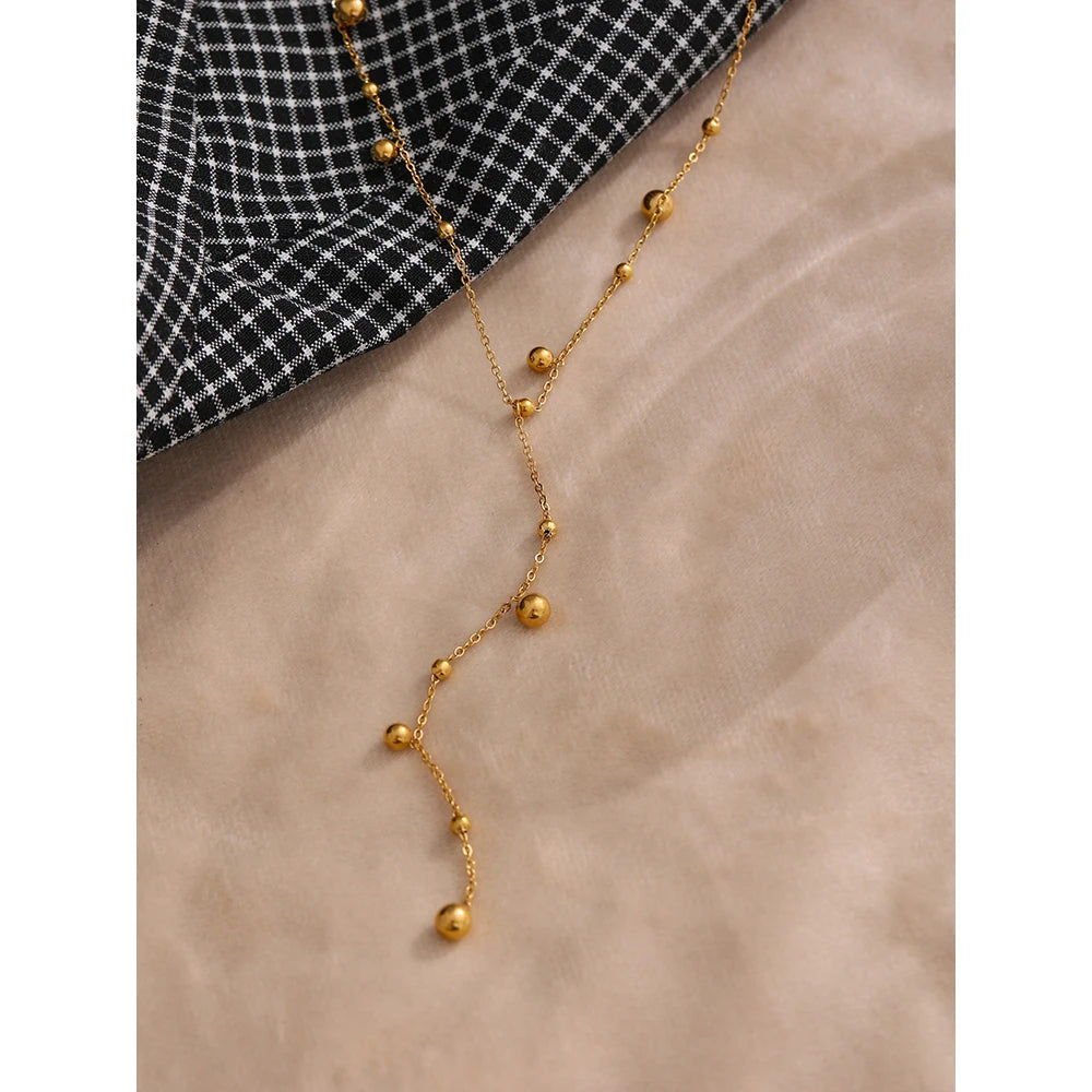 Collier long perlé – Acier inoxydable plaqué or 18K, style minimaliste