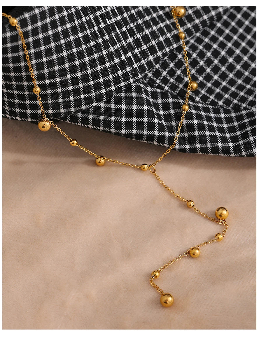 Collier long perlé – Acier inoxydable plaqué or 18K, style minimaliste