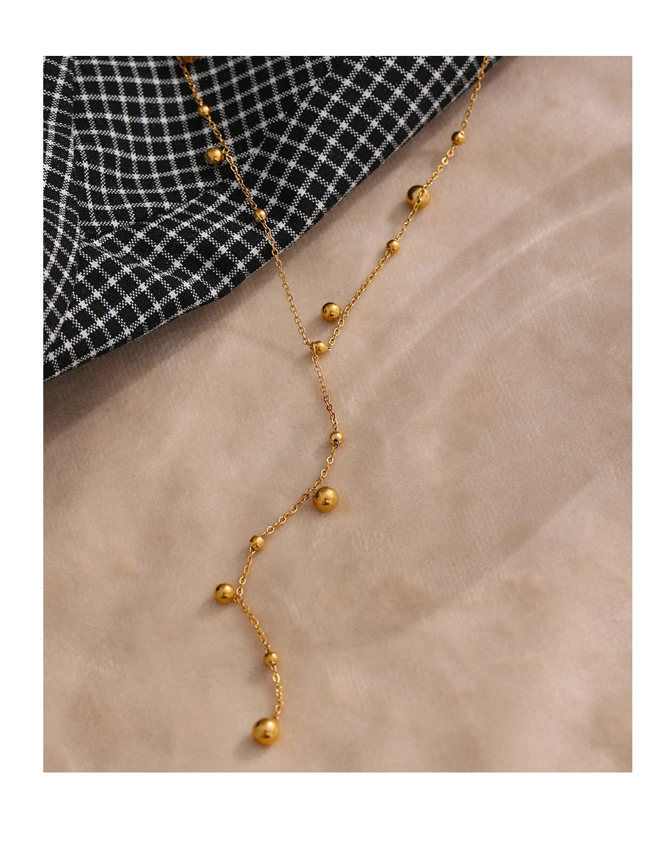 Collier long perlé – Acier inoxydable plaqué or 18K, style minimaliste