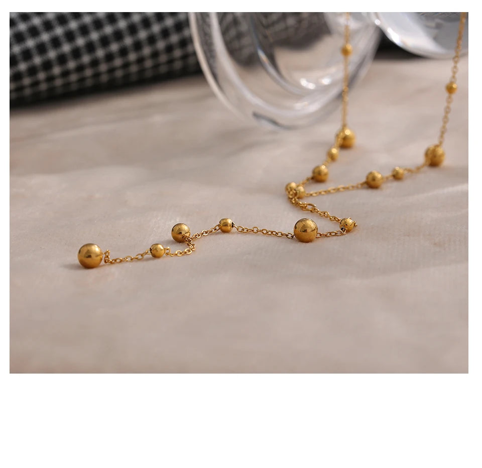 Collier long perlé – Acier inoxydable plaqué or 18K, style minimaliste