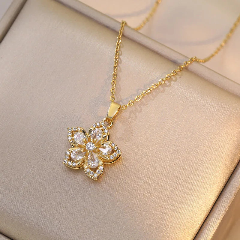Collier Fleur Rotative Anti-Stress – Acier Inoxydable Plaqué Or 18K & Zircone