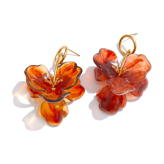 Boucles d’oreilles fleur résine blanche