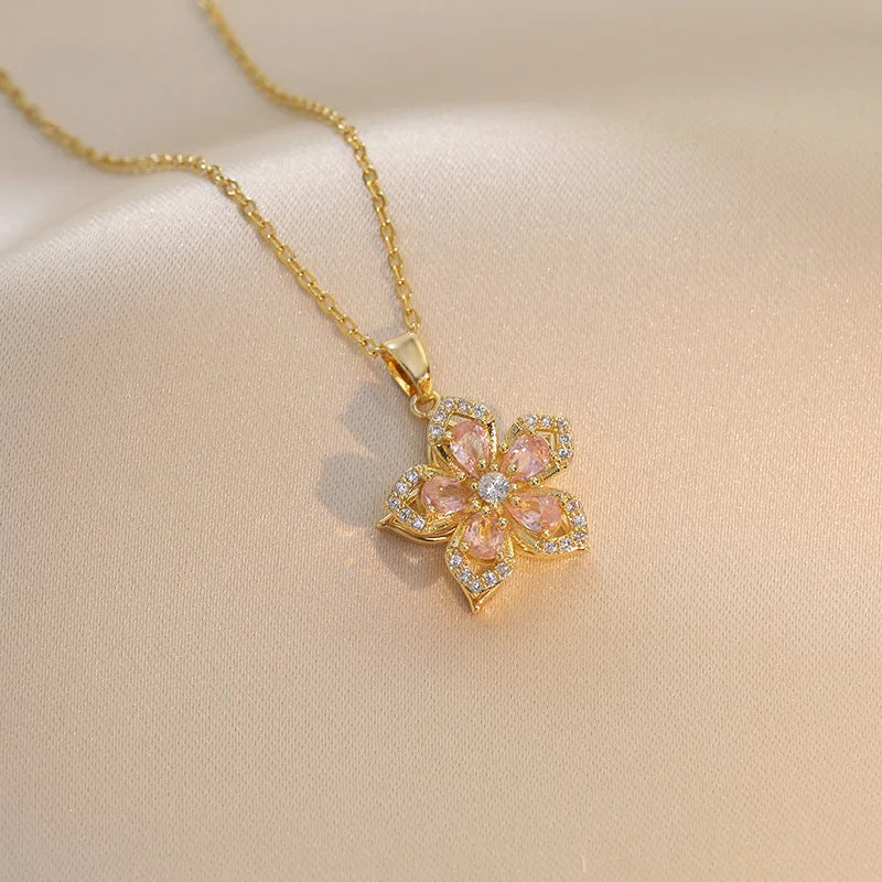 Collier Fleur Rotative Anti-Stress – Acier Inoxydable Plaqué Or 18K & Zircone