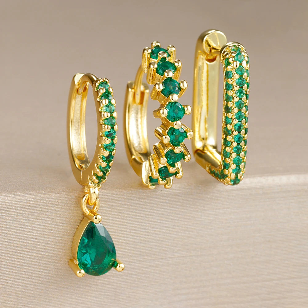 Set mit 3 goldenen Ohrringen – U-förmige Creolen und Zirkonia-Tropfenanhänger