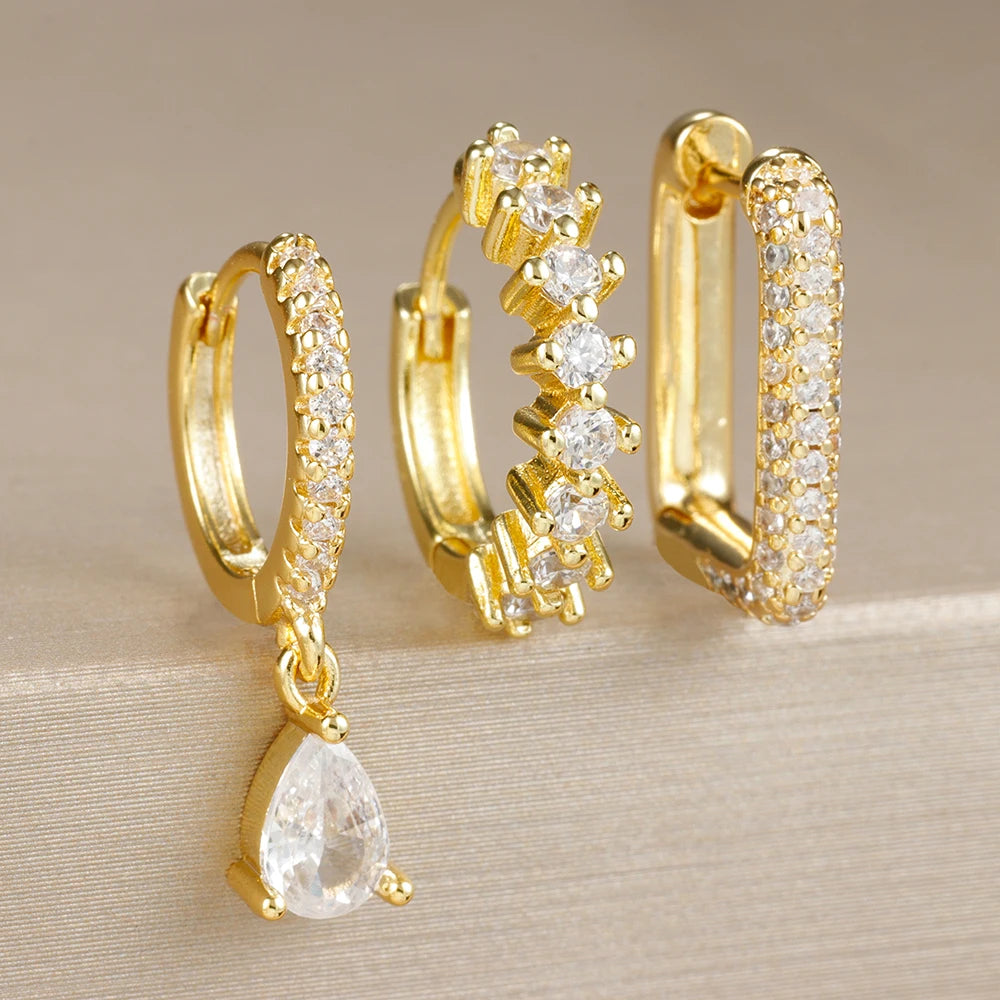 Set mit 3 goldenen Ohrringen – U-förmige Creolen und Zirkonia-Tropfenanhänger