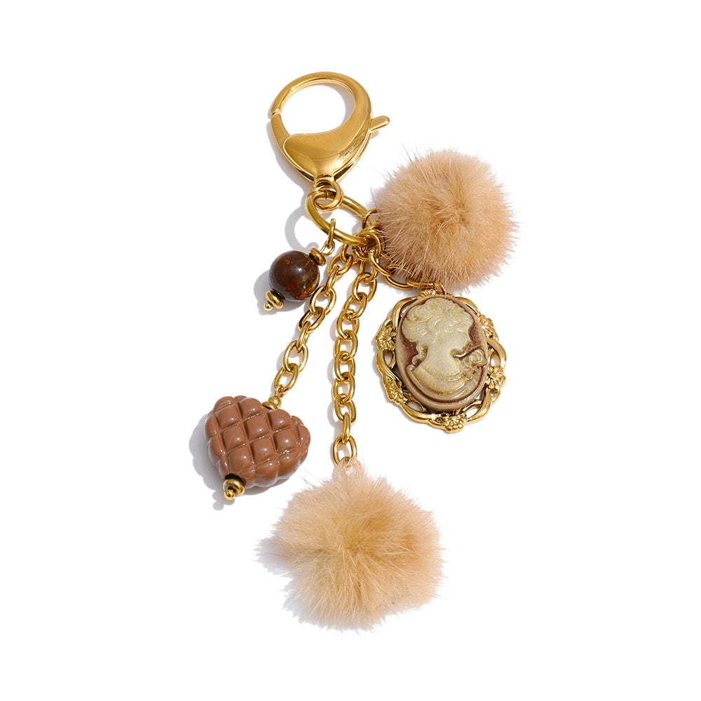 Porte-clés charms cœur et médaillon doré