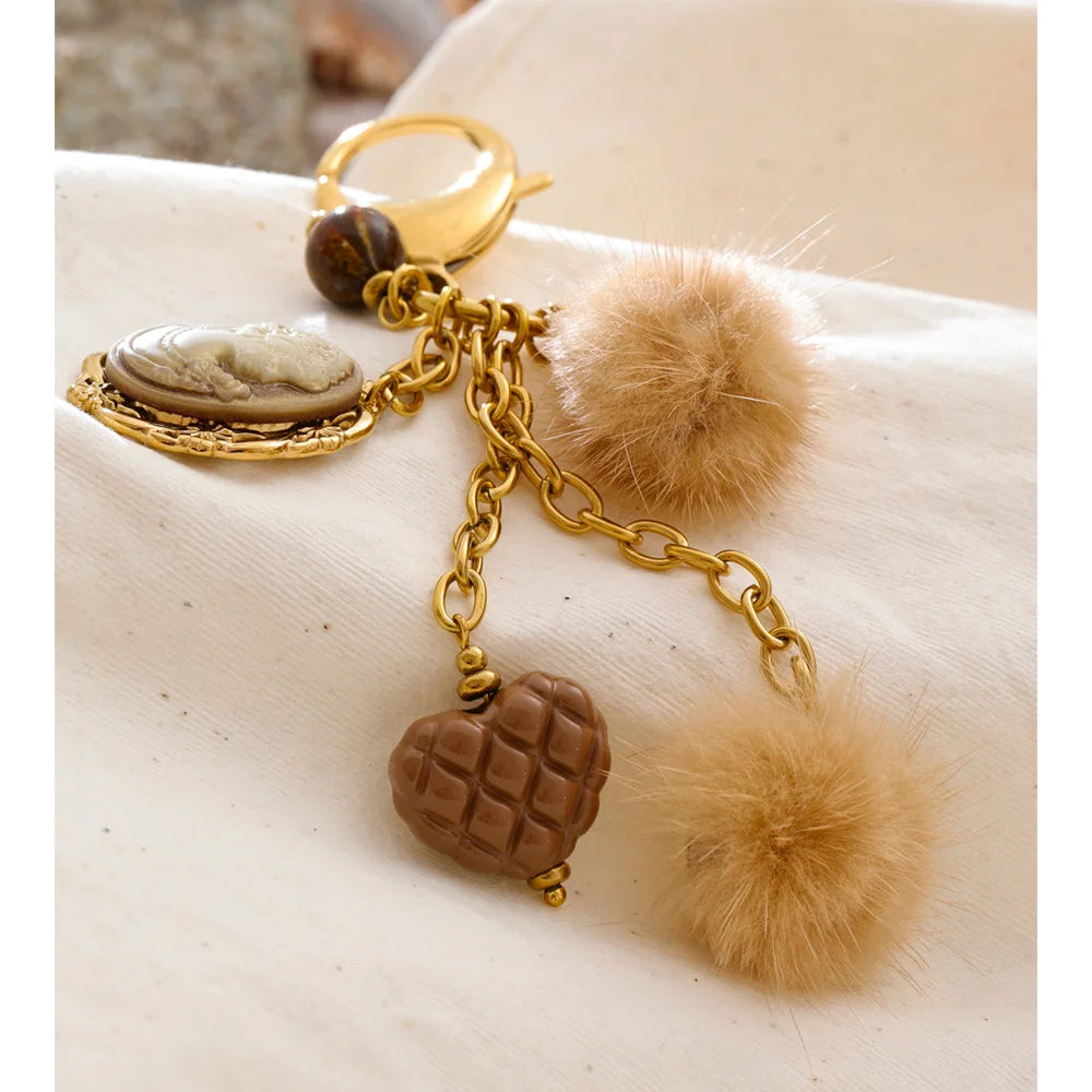 Porte-clés charms cœur et médaillon doré