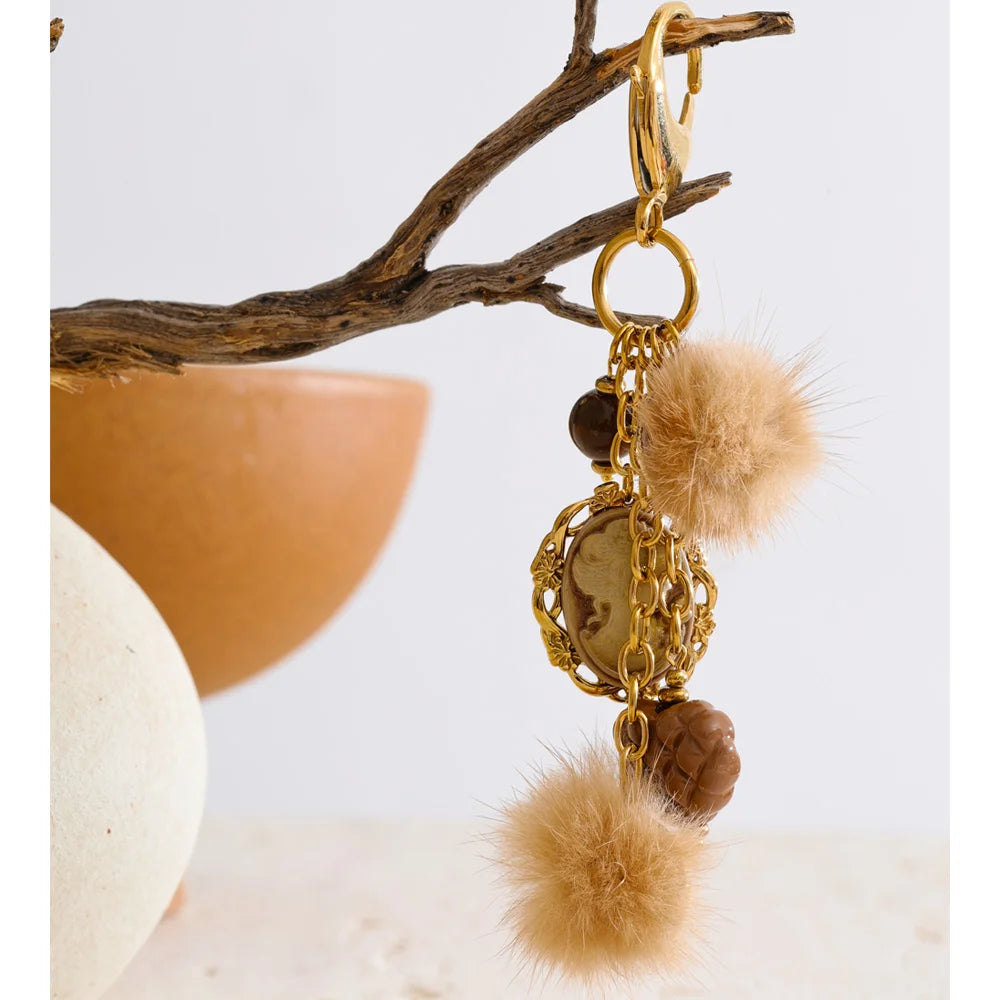 Porte-clés charms cœur et médaillon doré