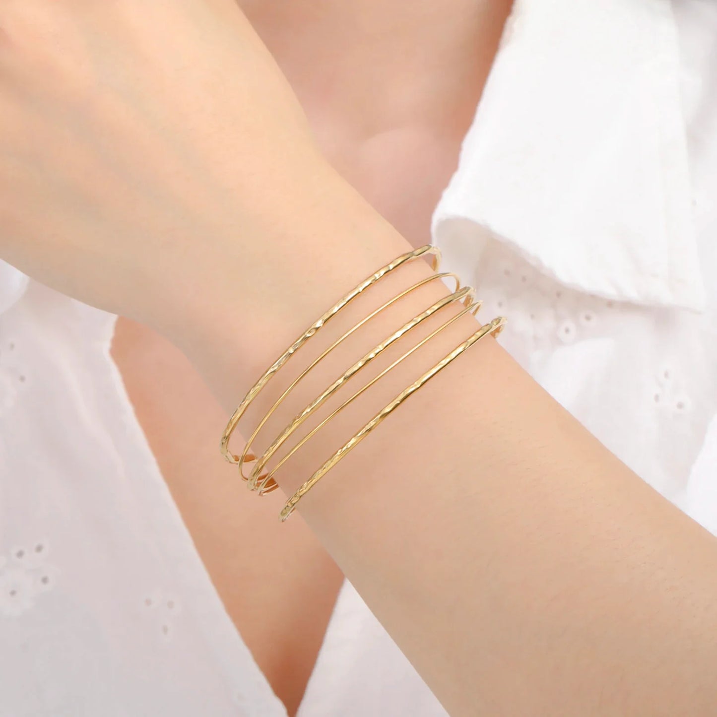 Bracelet manchette multi-rangs doré en acier inoxydable