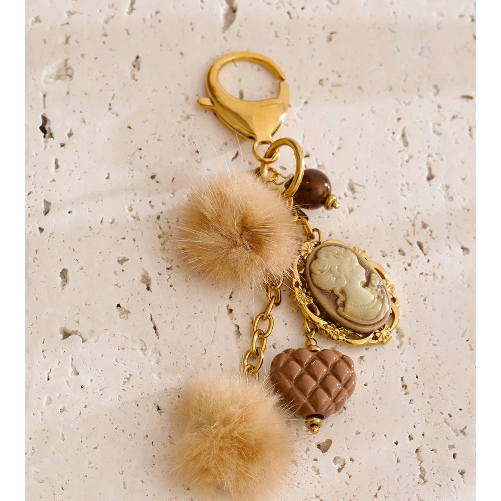 Porte-clés charms cœur et médaillon doré