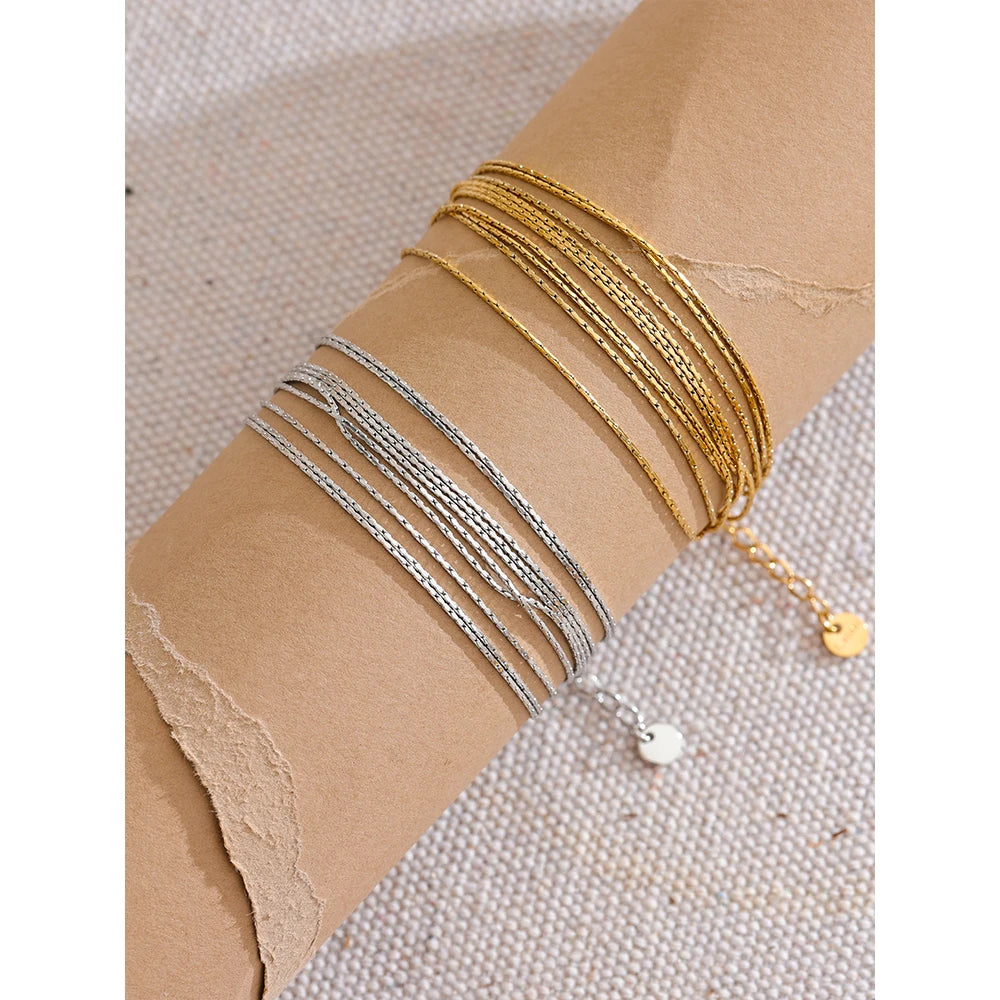 Bracelet multi-couches doré & platine – style superposé