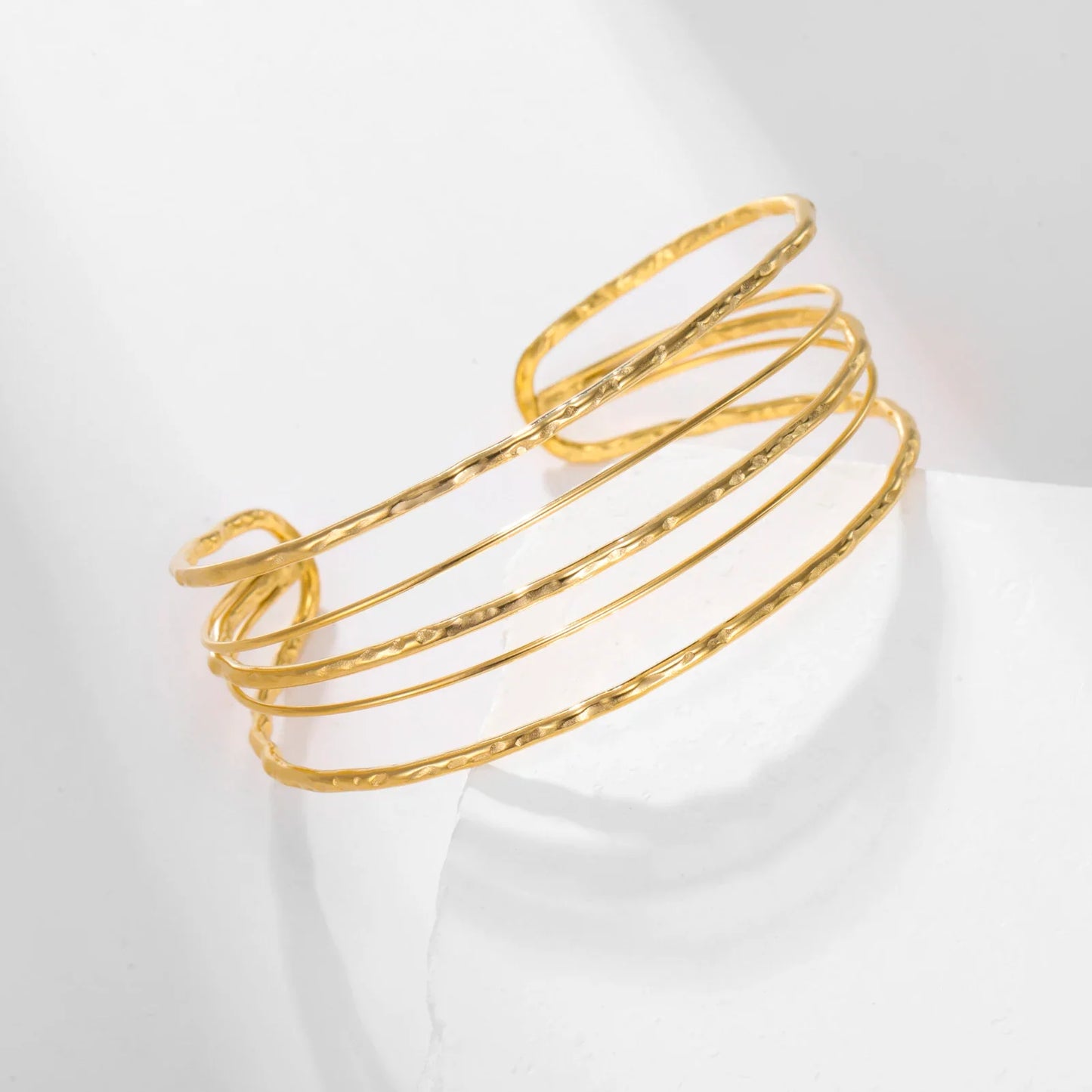 Bracelet manchette multi-rangs doré en acier inoxydable