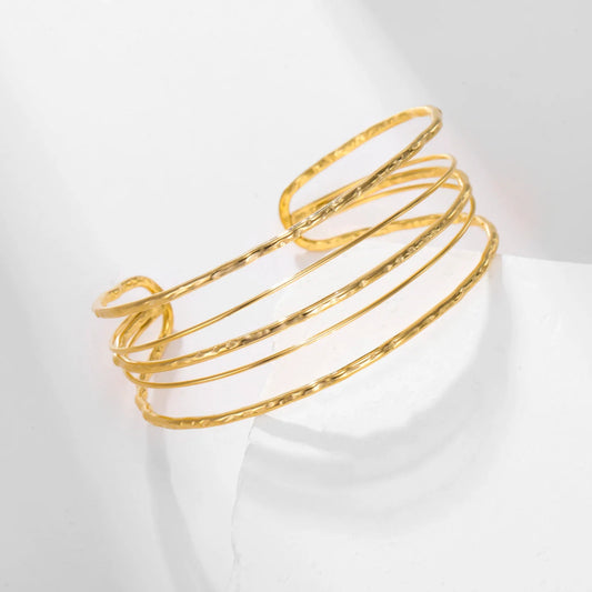Bracelet manchette multi-rangs doré en acier inoxydable